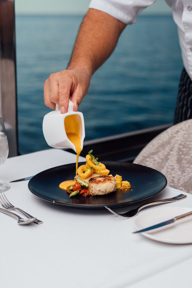 Chef prepared meal aboard the Ecoventura yacht